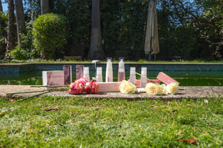 Florettee products on ground outdoors with a pool and trees in the background